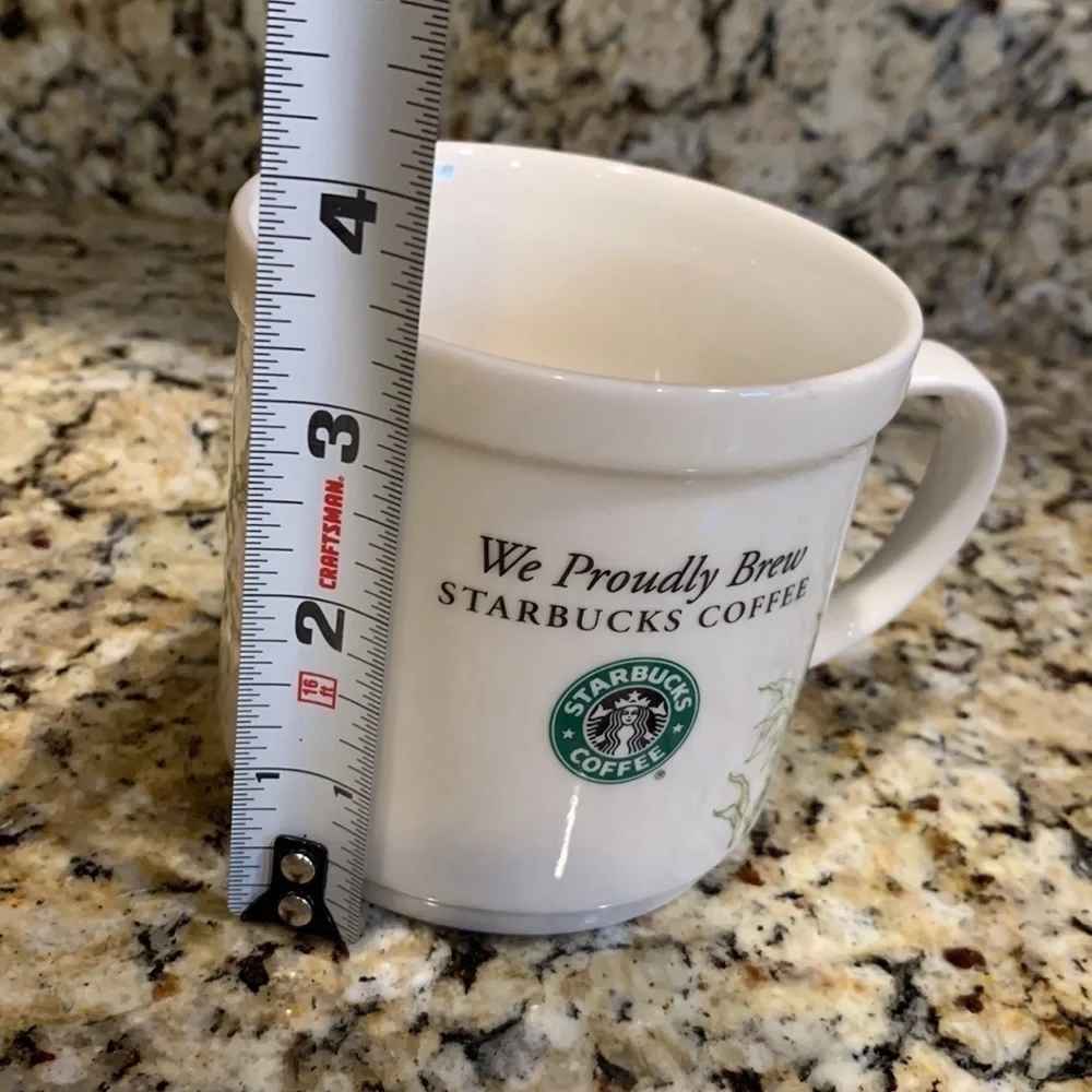 We Proudly Brew Starbucks coffee mug 12 ounces White and green